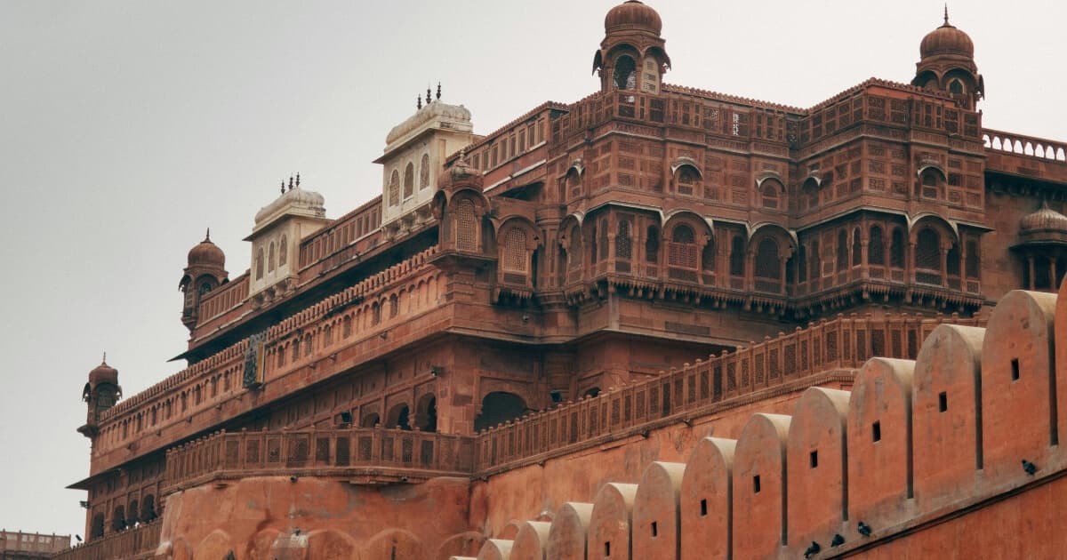 Junagarh Fort in Bikaner featuring magnificent red sandstone architecture, ornate balconies and traditional Rajput design