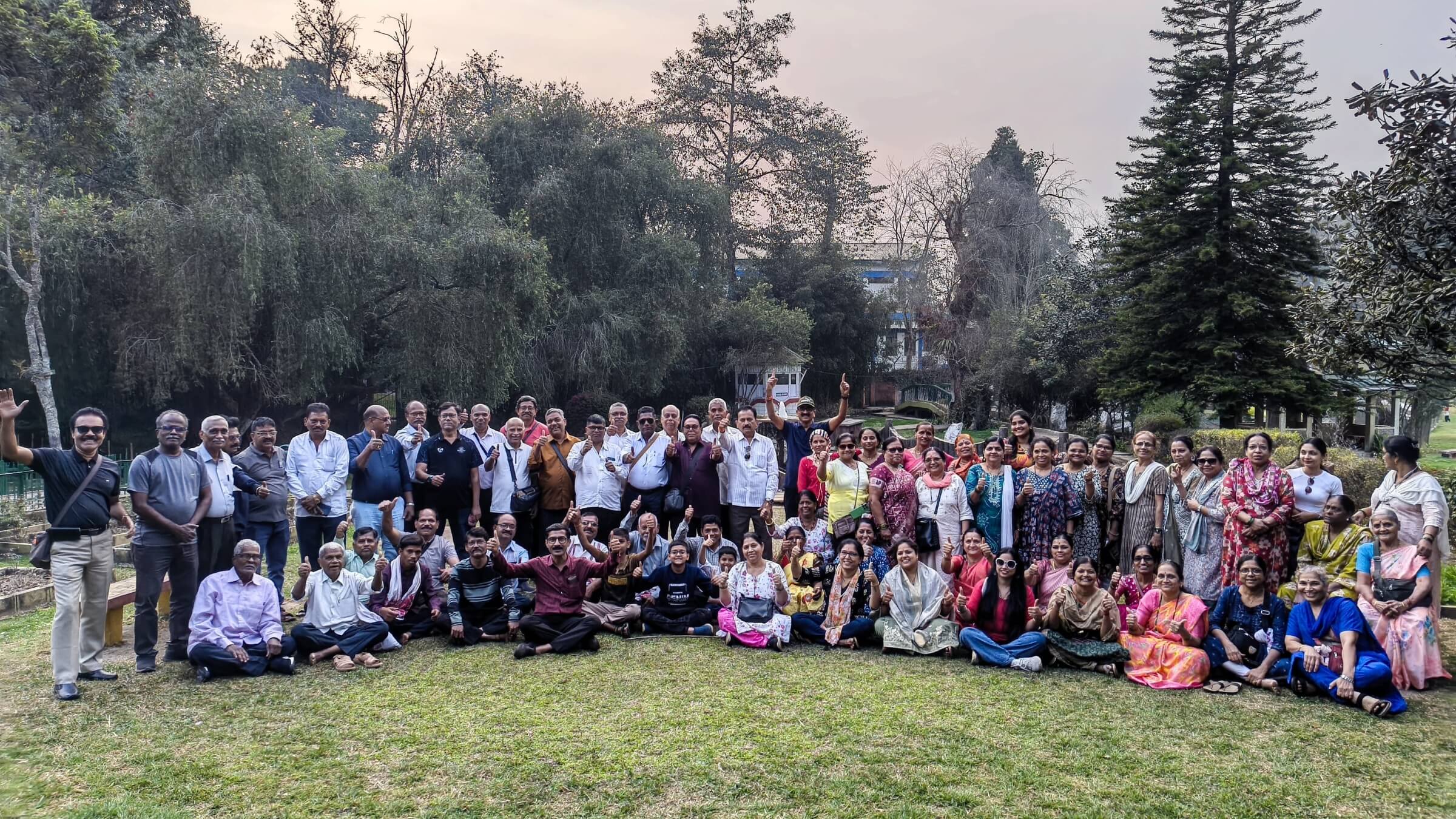 Large group of Prime Vistaa Holidays travellers posing together outdoors during a group tour