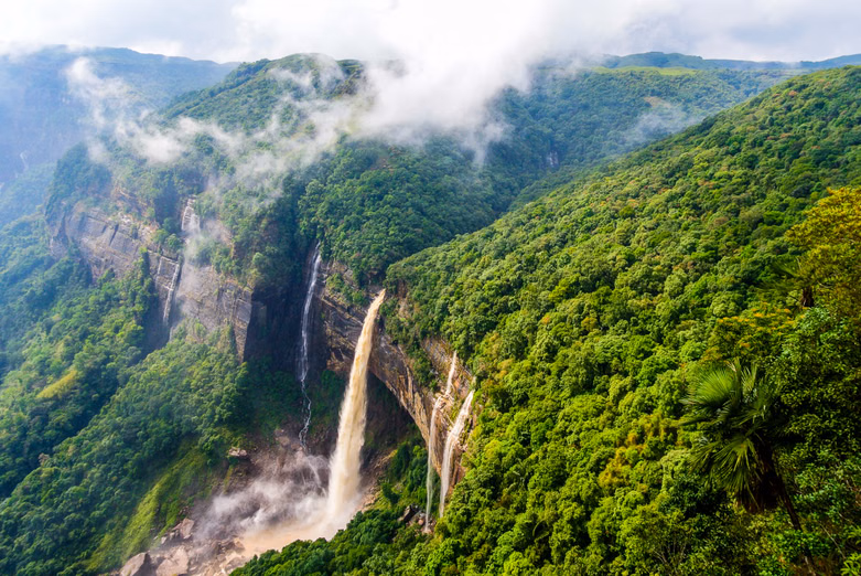 Seven Sisters Falls (Kynrem Falls) cascading down forested green cliffs near Cherrapunji, Meghalaya, in North East India