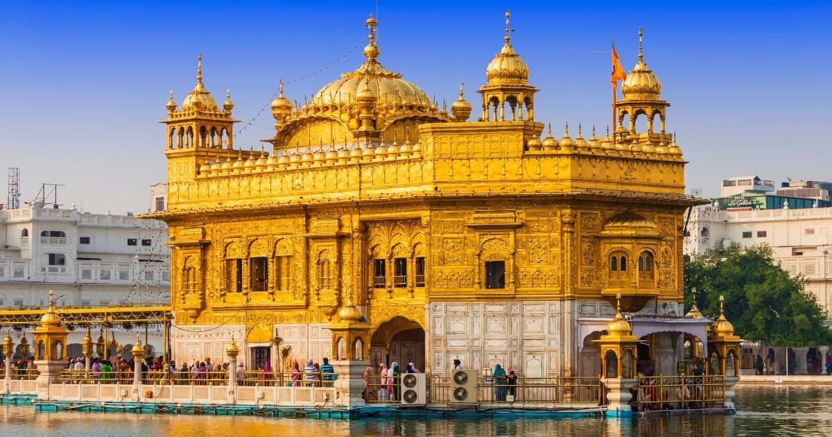 Golden Temple in Amritsar surrounded by the sacred Amrit Sarovar